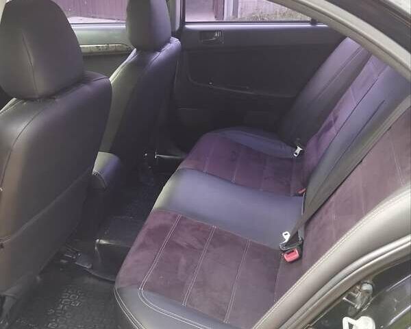 Чорний Міцубісі Lancer, об'ємом двигуна 1.5 л та пробігом 210 тис. км за 5800 $, фото 2 на Automoto.ua