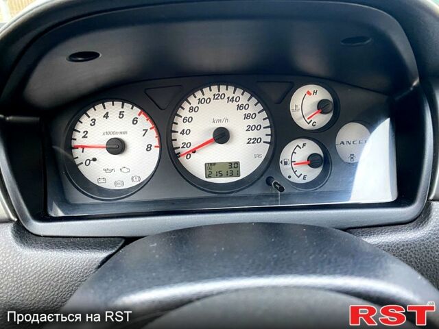 Черный Мицубиси Лансер, объемом двигателя 1.6 л и пробегом 240 тыс. км за 4200 $, фото 4 на Automoto.ua