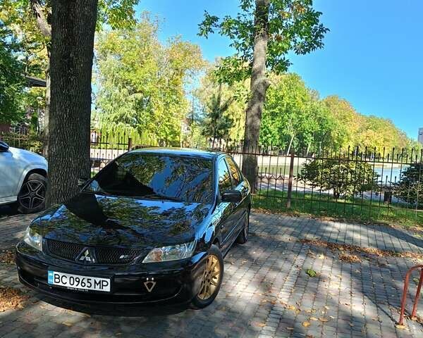 Мицубиси Лансер 2008 в Львове на Automoto.ua Черный Мицубиси Лансер, объемом двигателя 1.58 л и пробегом 200 тыс. км за 5200 $, фото 4 на Automoto.ua