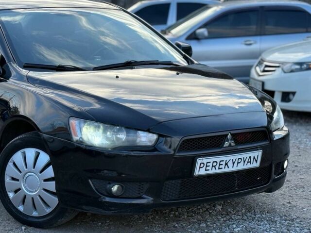 Чорний Міцубісі Lancer, об'ємом двигуна 1.5 л та пробігом 220 тис. км за 4600 $, фото 1 на Automoto.ua