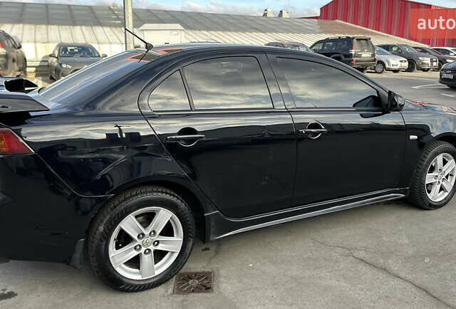 Чорний Міцубісі Lancer, об'ємом двигуна 2 л та пробігом 290 тис. км за 5900 $, фото 10 на Automoto.ua