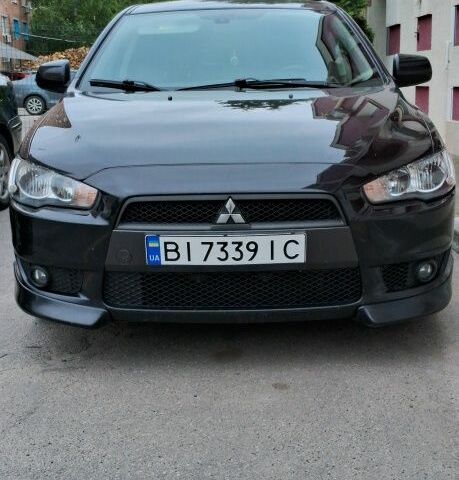 Чорний Міцубісі Lancer, об'ємом двигуна 2 л та пробігом 272 тис. км за 7800 $, фото 1 на Automoto.ua