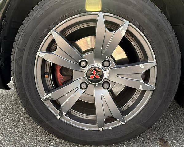 Черный Мицубиси Лансер, объемом двигателя 1.6 л и пробегом 321 тыс. км за 5000 $, фото 17 на Automoto.ua