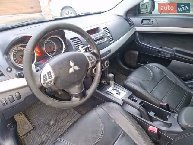 Чорний Міцубісі Lancer, об'ємом двигуна 2 л та пробігом 300 тис. км за 6000 $, фото 4 на Automoto.ua