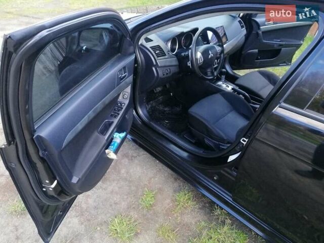 Мицубиси Лансер 2008 в Киеве на Automoto.ua Черный Мицубиси Лансер, объемом двигателя 2 л и пробегом 196 тыс. км за 5500 $, фото 18 на Automoto.ua