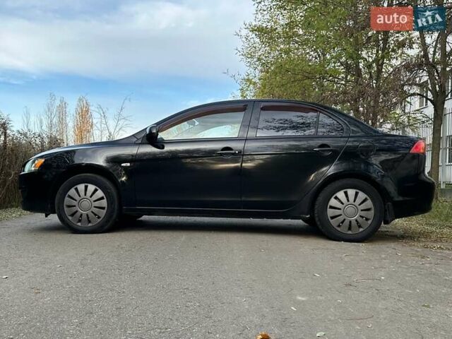 Черный Мицубиси Лансер, объемом двигателя 1.5 л и пробегом 285 тыс. км за 4800 $, фото 10 на Automoto.ua