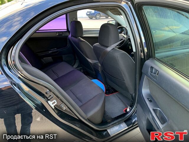 Чорний Міцубісі Lancer, об'ємом двигуна 1.5 л та пробігом 224 тис. км за 5299 $, фото 11 на Automoto.ua