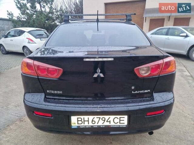 Чорний Міцубісі Lancer, об'ємом двигуна 2 л та пробігом 300 тис. км за 6000 $, фото 2 на Automoto.ua