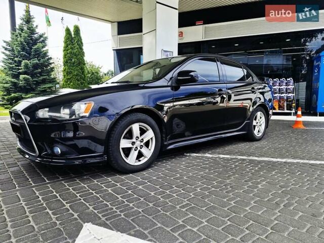 Чорний Міцубісі Lancer, об'ємом двигуна 2 л та пробігом 240 тис. км за 7850 $, фото 2 на Automoto.ua