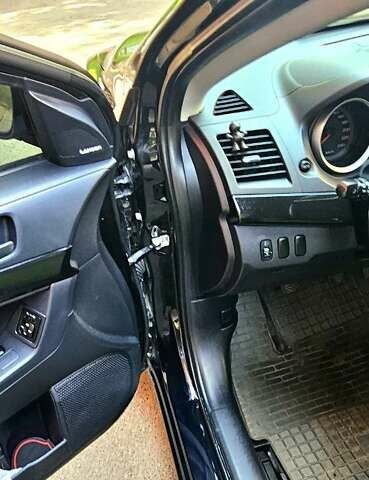 Черный Мицубиси Лансер, объемом двигателя 1.5 л и пробегом 205 тыс. км за 6300 $, фото 10 на Automoto.ua