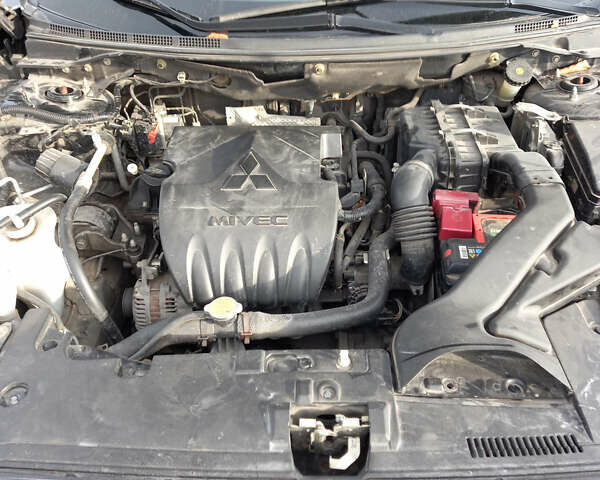 Чорний Міцубісі Lancer, об'ємом двигуна 1.5 л та пробігом 160 тис. км за 5850 $, фото 24 на Automoto.ua