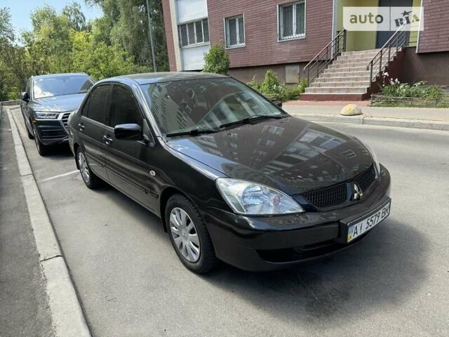 Чорний Міцубісі Lancer, об'ємом двигуна 1.6 л та пробігом 78 тис. км за 3999 $, фото 4 на Automoto.ua