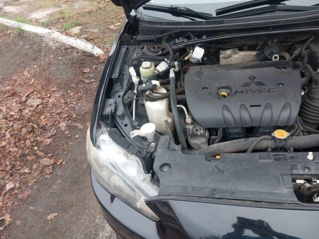 Чорний Міцубісі Lancer, об'ємом двигуна 2 л та пробігом 232 тис. км за 5000 $, фото 5 на Automoto.ua