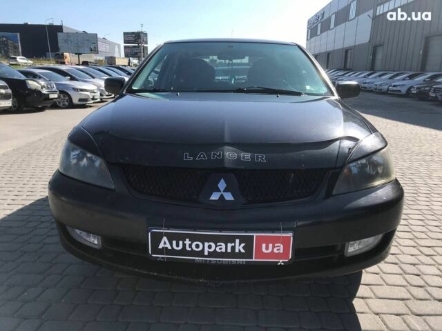 Чорний Міцубісі Lancer, об'ємом двигуна 1.6 л та пробігом 356 тис. км за 4590 $, фото 1 на Automoto.ua