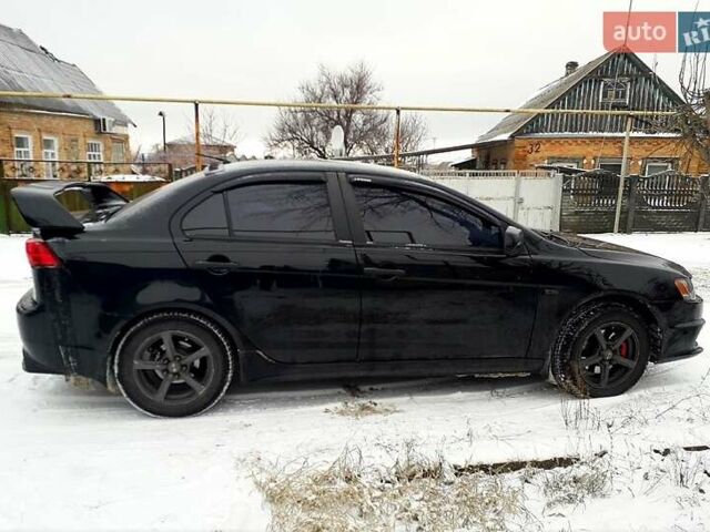 Чорний Міцубісі Lancer, об'ємом двигуна 2 л та пробігом 208 тис. км за 9500 $, фото 1 на Automoto.ua