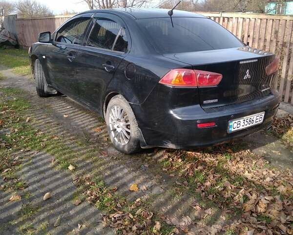Черный Мицубиси Лансер, объемом двигателя 1.5 л и пробегом 219 тыс. км за 6000 $, фото 6 на Automoto.ua