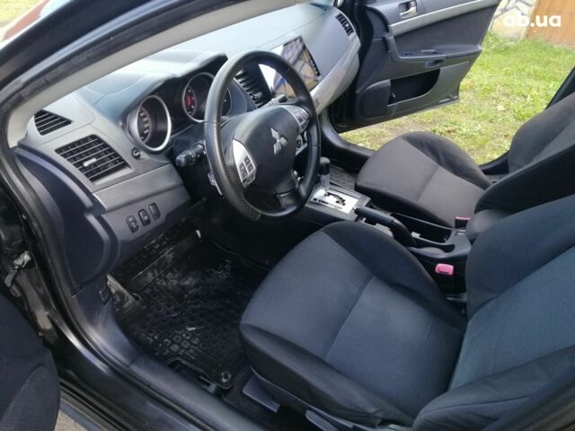 Мицубиси Лансер 2008 в Киеве на Automoto.ua Черный Мицубиси Лансер, объемом двигателя 0 л и пробегом 196 тыс. км за 5700 $, фото 9 на Automoto.ua