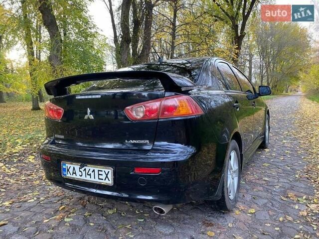 Чорний Міцубісі Lancer, об'ємом двигуна 2 л та пробігом 237 тис. км за 7500 $, фото 5 на Automoto.ua