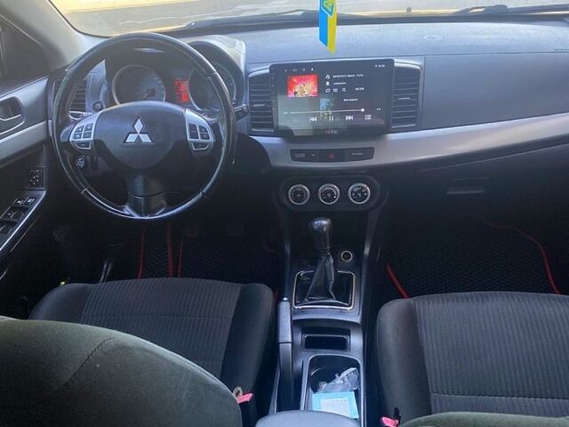 Чорний Міцубісі Lancer, об'ємом двигуна 2 л та пробігом 220 тис. км за 6300 $, фото 7 на Automoto.ua