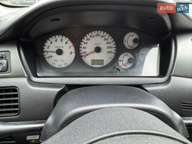 Черный Мицубиси Лансер, объемом двигателя 1.58 л и пробегом 202 тыс. км за 4100 $, фото 5 на Automoto.ua