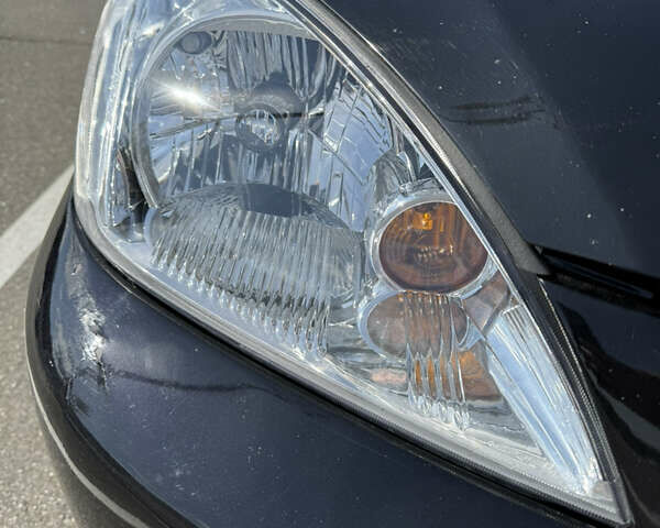 Черный Мицубиси Лансер, объемом двигателя 1.6 л и пробегом 321 тыс. км за 5000 $, фото 45 на Automoto.ua