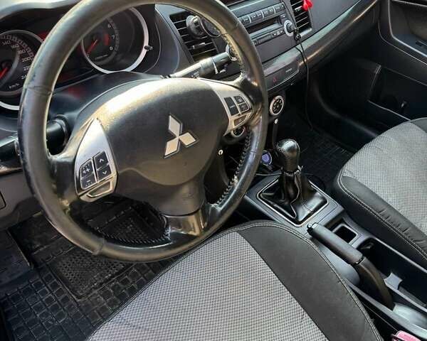 Чорний Міцубісі Lancer, об'ємом двигуна 2 л та пробігом 150 тис. км за 6500 $, фото 11 на Automoto.ua