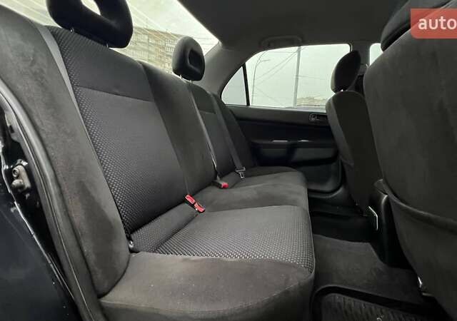 Чорний Міцубісі Lancer, об'ємом двигуна 1.6 л та пробігом 340 тис. км за 6190 $, фото 10 на Automoto.ua