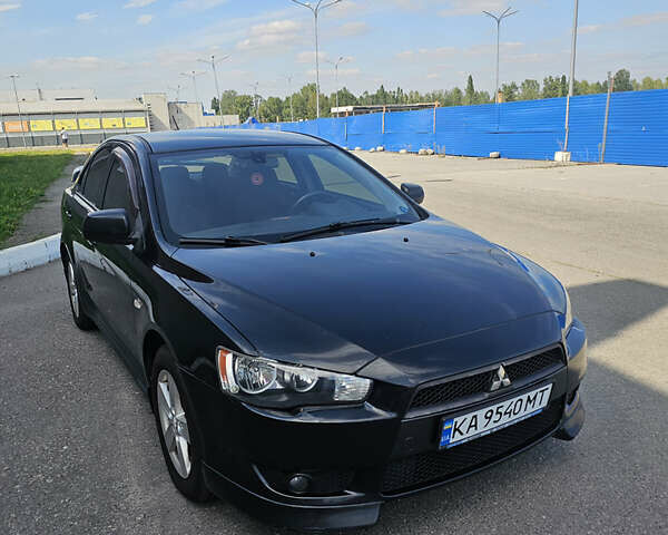Чорний Міцубісі Lancer, об'ємом двигуна 2 л та пробігом 249 тис. км за 6500 $, фото 1 на Automoto.ua
