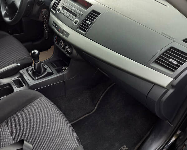 Чорний Міцубісі Lancer, об'ємом двигуна 1.5 л та пробігом 160 тис. км за 5850 $, фото 22 на Automoto.ua