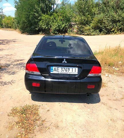 Чорний Міцубісі Lancer, об'ємом двигуна 1.6 л та пробігом 245 тис. км за 3200 $, фото 2 на Automoto.ua