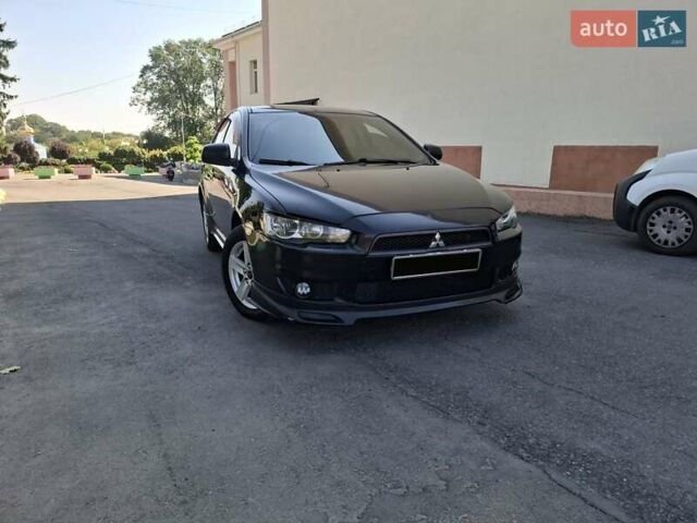 Черный Мицубиси Лансер, объемом двигателя 2 л и пробегом 230 тыс. км за 7000 $, фото 19 на Automoto.ua