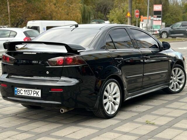 Чорний Міцубісі Lancer, об'ємом двигуна 2 л та пробігом 236 тис. км за 7900 $, фото 3 на Automoto.ua