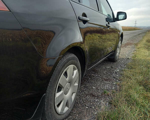 Чорний Міцубісі Lancer, об'ємом двигуна 1.5 л та пробігом 160 тис. км за 5850 $, фото 23 на Automoto.ua