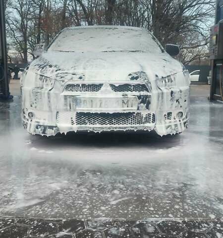 Черный Мицубиси Лансер, объемом двигателя 2 л и пробегом 217 тыс. км за 7000 $, фото 38 на Automoto.ua