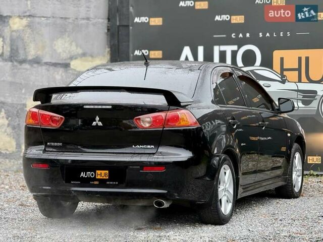 Чорний Міцубісі Lancer, об'ємом двигуна 2 л та пробігом 118 тис. км за 6200 $, фото 6 на Automoto.ua