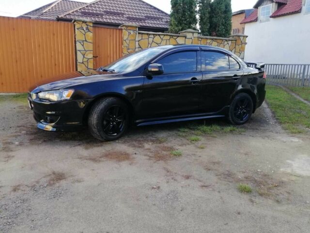 Міцубісі Lancer 2008 у Києві на Automoto.ua Чорний Міцубісі Lancer, об'ємом двигуна 2 л та пробігом 196 тис. км за 5500 $, фото 6 на Automoto.ua