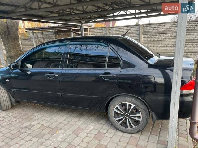 Чорний Міцубісі Lancer, об'ємом двигуна 1.6 л та пробігом 324 тис. км за 3800 $, фото 2 на Automoto.ua