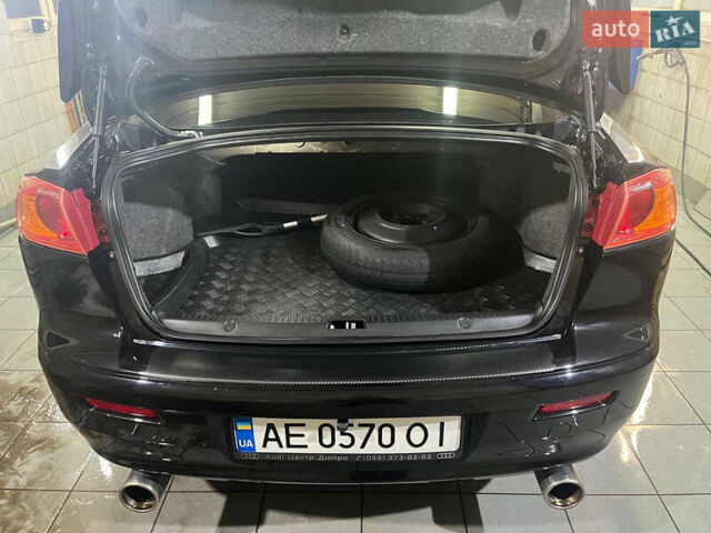 Черный Мицубиси Лансер, объемом двигателя 2 л и пробегом 200 тыс. км за 8000 $, фото 17 на Automoto.ua