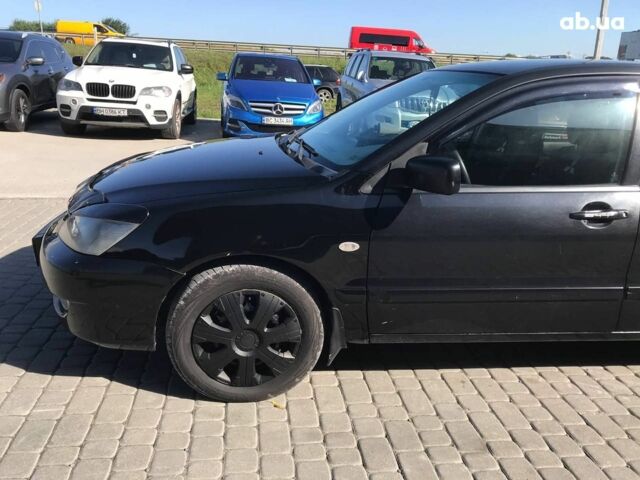 Чорний Міцубісі Lancer, об'ємом двигуна 1.6 л та пробігом 356 тис. км за 4590 $, фото 15 на Automoto.ua