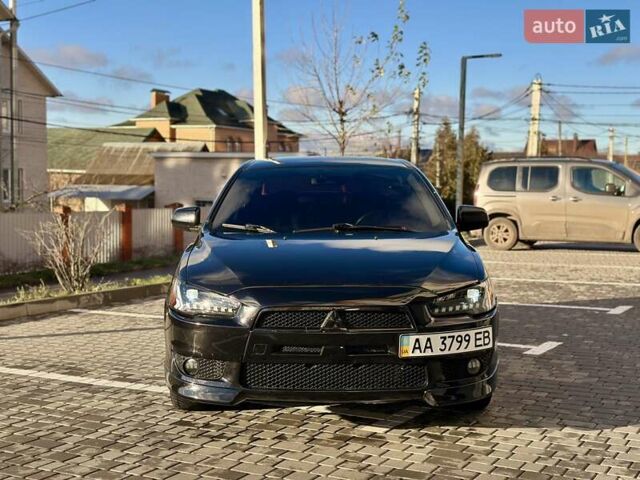 Чорний Міцубісі Lancer, об'ємом двигуна 2 л та пробігом 150 тис. км за 7999 $, фото 5 на Automoto.ua