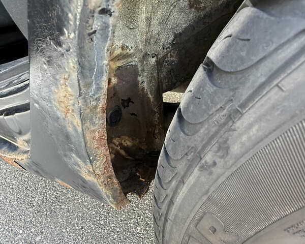 Черный Мицубиси Лансер, объемом двигателя 1.6 л и пробегом 321 тыс. км за 5000 $, фото 39 на Automoto.ua