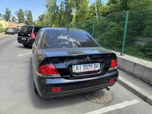 Чорний Міцубісі Lancer, об'ємом двигуна 1.6 л та пробігом 78 тис. км за 3999 $, фото 5 на Automoto.ua