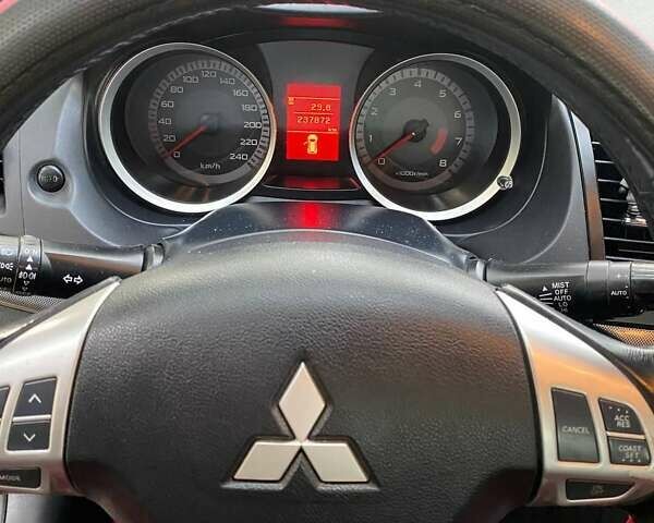 Чорний Міцубісі Lancer, об'ємом двигуна 2 л та пробігом 237 тис. км за 7500 $, фото 17 на Automoto.ua