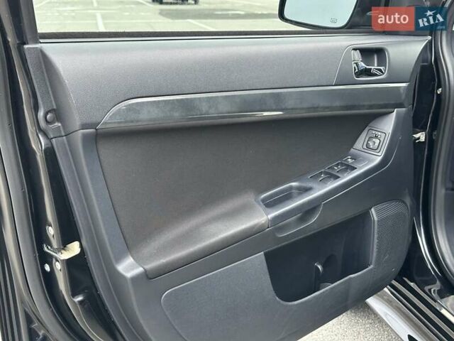 Чорний Міцубісі Lancer, об'ємом двигуна 2 л та пробігом 199 тис. км за 7900 $, фото 24 на Automoto.ua