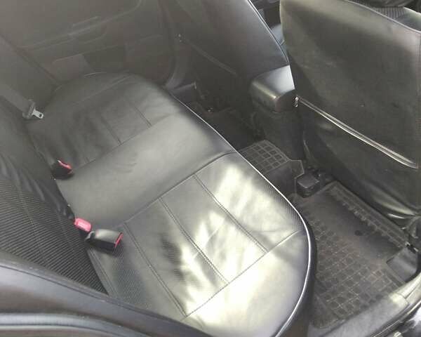 Черный Мицубиси Лансер, объемом двигателя 1.5 л и пробегом 219 тыс. км за 6000 $, фото 1 на Automoto.ua