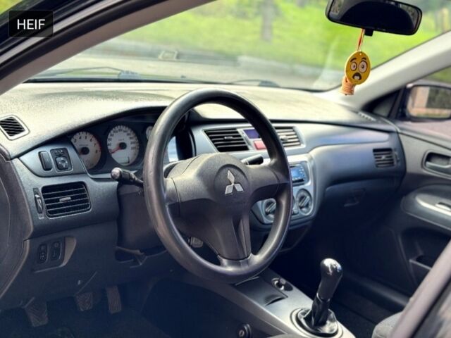 Чорний Міцубісі Lancer, об'ємом двигуна 1.6 л та пробігом 280 тис. км за 4350 $, фото 7 на Automoto.ua