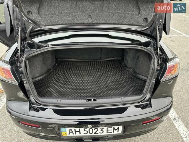 Чорний Міцубісі Lancer, об'ємом двигуна 2 л та пробігом 199 тис. км за 7900 $, фото 35 на Automoto.ua