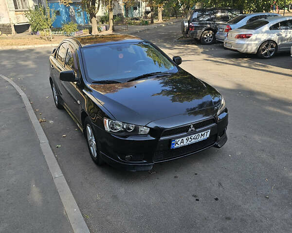 Чорний Міцубісі Lancer, об'ємом двигуна 2 л та пробігом 249 тис. км за 6500 $, фото 11 на Automoto.ua