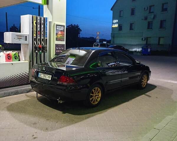 Мицубиси Лансер 2008 в Львове на Automoto.ua Черный Мицубиси Лансер, объемом двигателя 1.58 л и пробегом 200 тыс. км за 5200 $, фото 155 на Automoto.ua