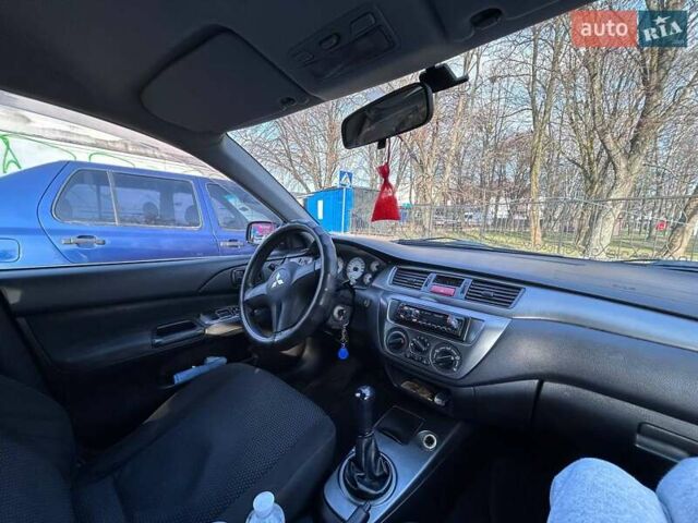 Чорний Міцубісі Lancer, об'ємом двигуна 1.6 л та пробігом 310 тис. км за 3500 $, фото 42 на Automoto.ua